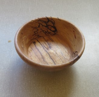A small spalted beech bowl by Geoff Christie